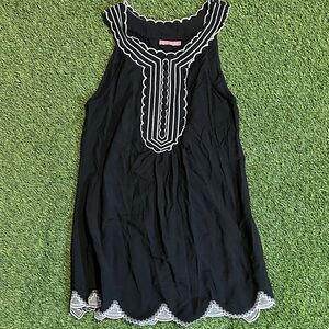 Inspira Black Sleeveless Top with White Trim